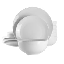 White porcelain dinnerware set with stacked dinner plates and bowls