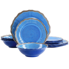 Blue melamine dinnerware set with scalloped rims: plates and bowls.