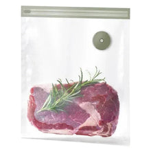 Vacuum bag with rosemary and pink meat, gray seal valve.