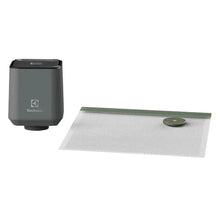 Handheld vacuum sealer pump with reusable vacuum bag, gray.