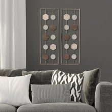 Set of 2 metal geometric wall decor panels in dark frames, circles and hexagons