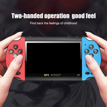 Handheld retro game console held in hands, red left and blue right control panels