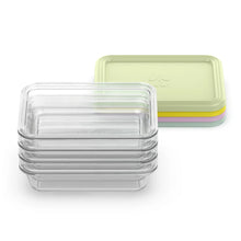 Glass meal prep container set with clear lid and bases, with a lime-green back container