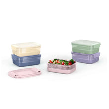 Assorted plastic meal prep containers with snap lids and salad in one container