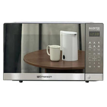 Countertop inverter microwave with mirror-finish stainless front, glass door closed