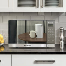Over-the-counter microwave with mirror-finish stainless face and touch control panel