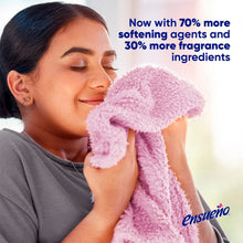 Woman pressing a pink terry cloth to her face, with '70% more' softening text