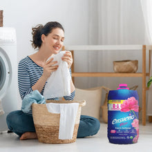 Blue Ensueño Max fabric softener bottle with pink blossoms and magenta cap