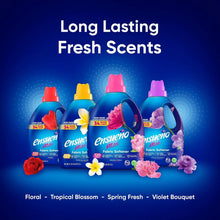 Lineup of Ensueño Max fabric softener bottles with floral scent labels
