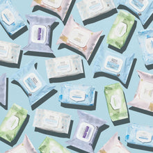 Facial cleansing towelettes assortment with blue and green re-moistened packs