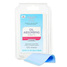 Oil absorbing sheets pack with blue-edged sheet partially pulled out