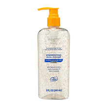 Facial cleanser bottle with orange pump, clear speckled container