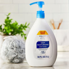 Deep moisturizing body wash bottle with blue pump, 34 fl oz