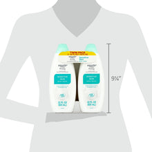 Two sensitive skin body wash bottles, white with teal accents, twin pack