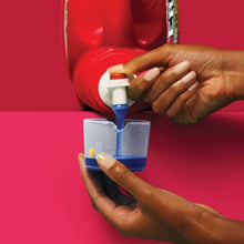 Era Active Stainfighter liquid detergent bottle dispensing from spout