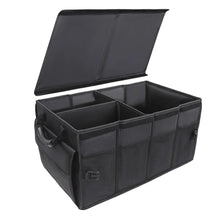 Black trunk organizer with hinged lid and interior compartment dividers