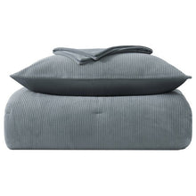 Blue mini waffle plush comforter set folded with a matching pillow