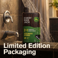 2-in-1 shampoo+conditioner bottle with green label in splash of water