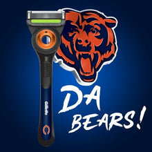 Razor handle with orange dial detail and Bears head graphic