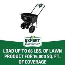 Push broadcast spreader with black hopper, four wheels, and long push handle