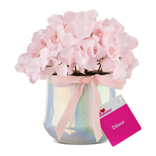 Pink hydrangea floral pot with ribbon bow and pink gift tag
