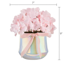 Pink hydrangea floral pot, 7 in wide x 9 in tall, with ribbon bow