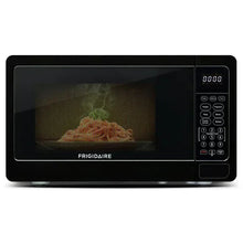 Black countertop microwave oven with front window and right-side control keypad