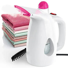 Handheld fabric garment steamer with white body and pink top, steam nozzle and handle