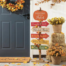 Wooden fall pumpkin patch porch sign with stacked arrow placards and pumpkin topper