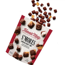 S'mores snack mix bag with scattered chocolate pieces and marshmallows