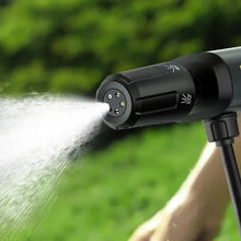 Fanttik cordless sprayer spraying mist from front outlet with nozzle
