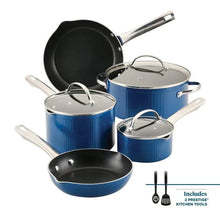 Blue nonstick cookware set with stainless handles and fitted lids plus skillet