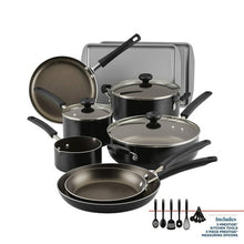 Black nonstick cookware set with skillets, saucepans, griddle, and matching cooking tools