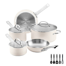Stainless steel cookware set with lids and cooking utensils, metal tools