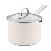 White stainless steel straining saucepan with glass lid and pouring spout, 3-quart