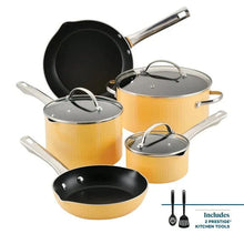 Yellow nonstick cookware set with lids: two pots, one saucepan, and a frying pan