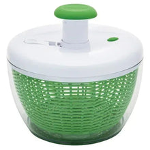 Salad spinner with white lid and green top cap, clear bowl and green strainer