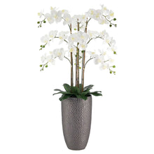 Faux Phalaenopsis orchid with white blossoms in a gray textured vase