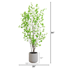 Faux Enkianthus tree, tall with bright green leaves, in gray cylindrical pot