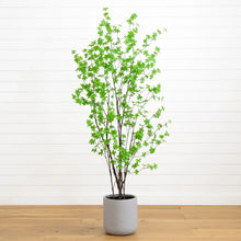 Faux enkianthus tree with green leaves in a light gray planter pot