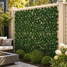 Expandable faux gardenia trellis mounted on a fence, with green leaves across the lattice