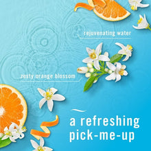 Febreze Air Effects air freshener spray ad with orange blossom and white flowers