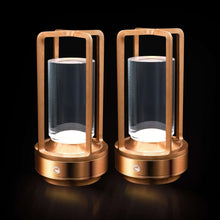 Rechargeable LED lantern 2-pack with bronze body, glass sides, warm white glow