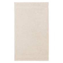 Cream bath towel, rectangular folded terry towel with neat hem finish