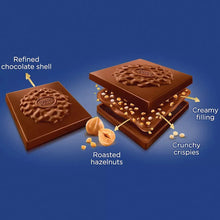 Assorted chocolate squares with hazelnuts, crunchy crispies and creamy filling