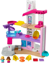 Barbie Little DreamHouse toddler playset with pink-and-purple house, stairs, slide and accessories