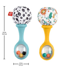 Two baby rattle maracas with blue and yellow handles, patterned ball ends.