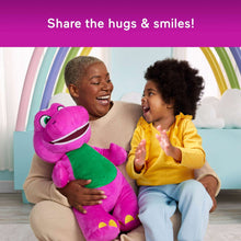 Purple Barney-style plush dinosaur held in a child’s arms, showing green belly