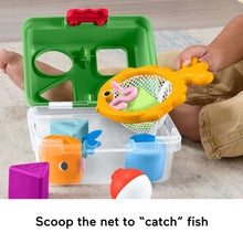 Open green tackle box with fish-shaped net and orange fish block