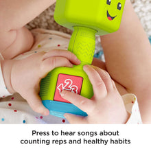 Green dumbbell rattle with count-rep button panel pressed, light accents